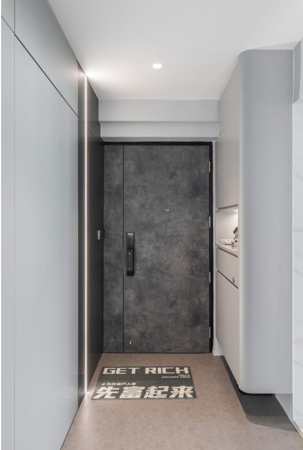 Modern Entryway with Shoe Cabinets and Doors
