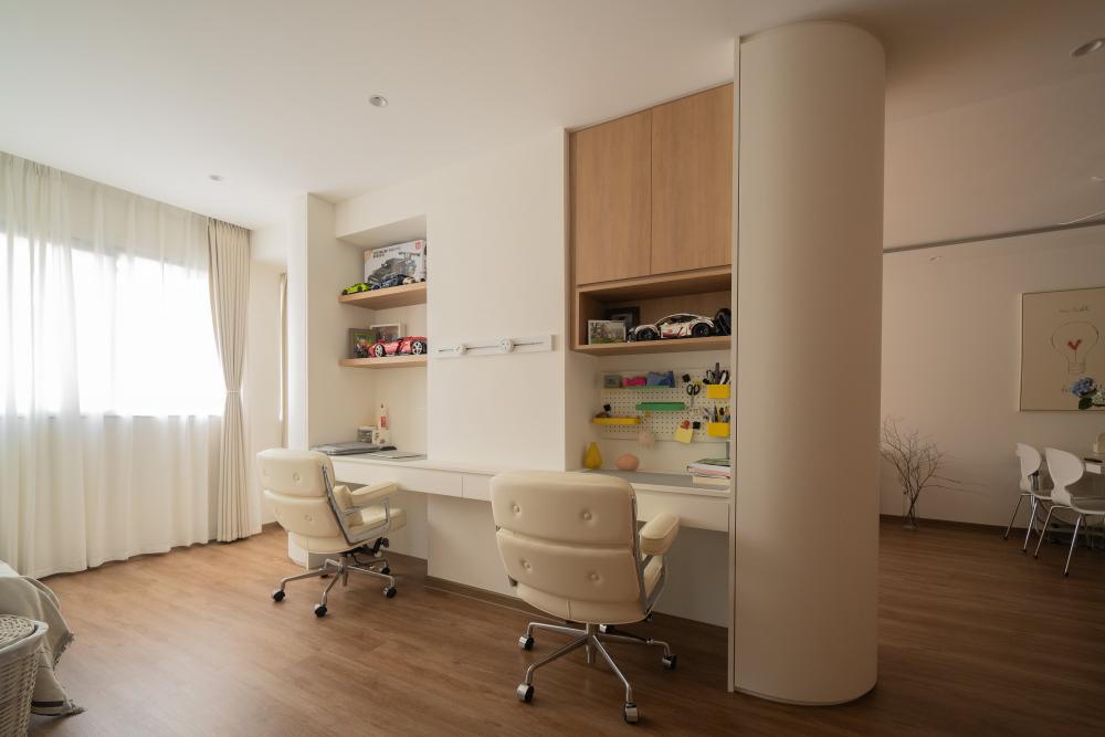 Minimalist Study with Bookshelf and Cove Lighting