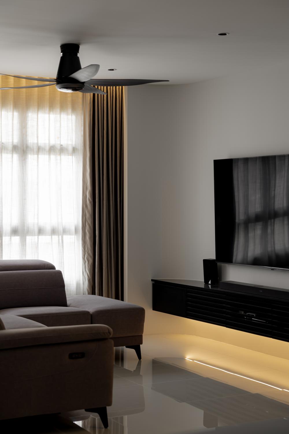 Modern Living Room with Cove Lighting and Ceiling Fan