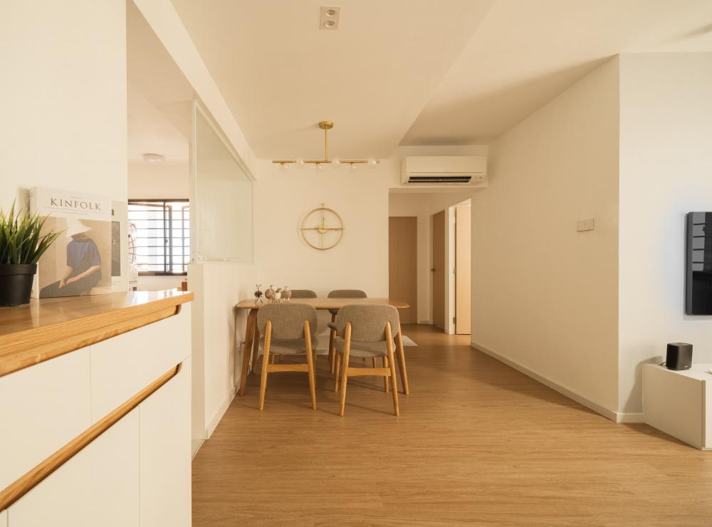 Minimalist Dining Room with Bookshelf and Wood Flooring