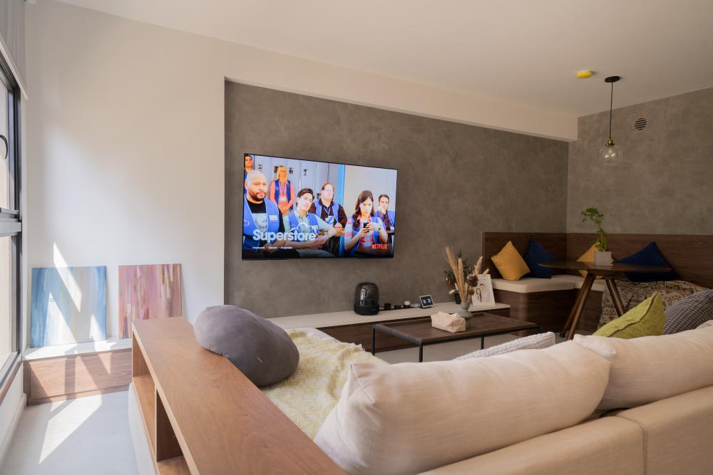 Contemporary Living Room with Bookshelf and TV Console