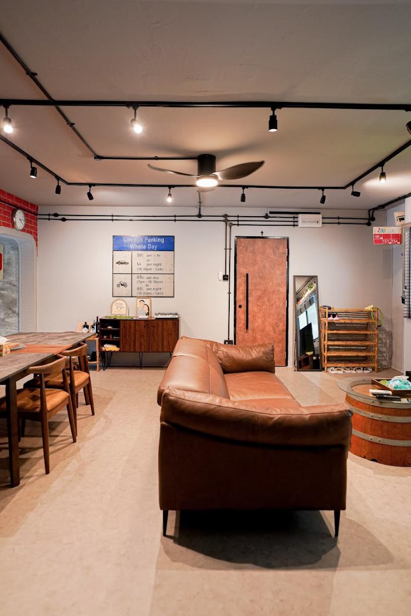 Industrial Living Room with Cement Floor and TV Console