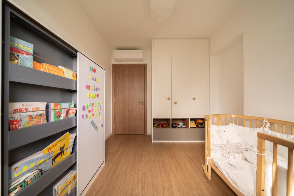 Contemporary Kids Room with Bookshelf and Toys