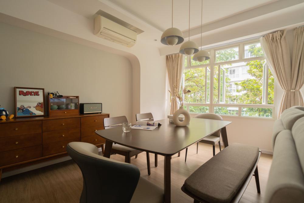 Contemporary Dining Room with Drop Light and Dining Chairs