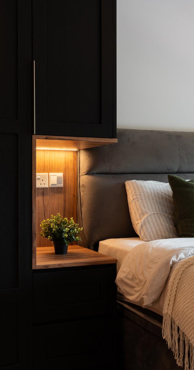 Industrial Bedroom with Wood Flooring and Wardrobe