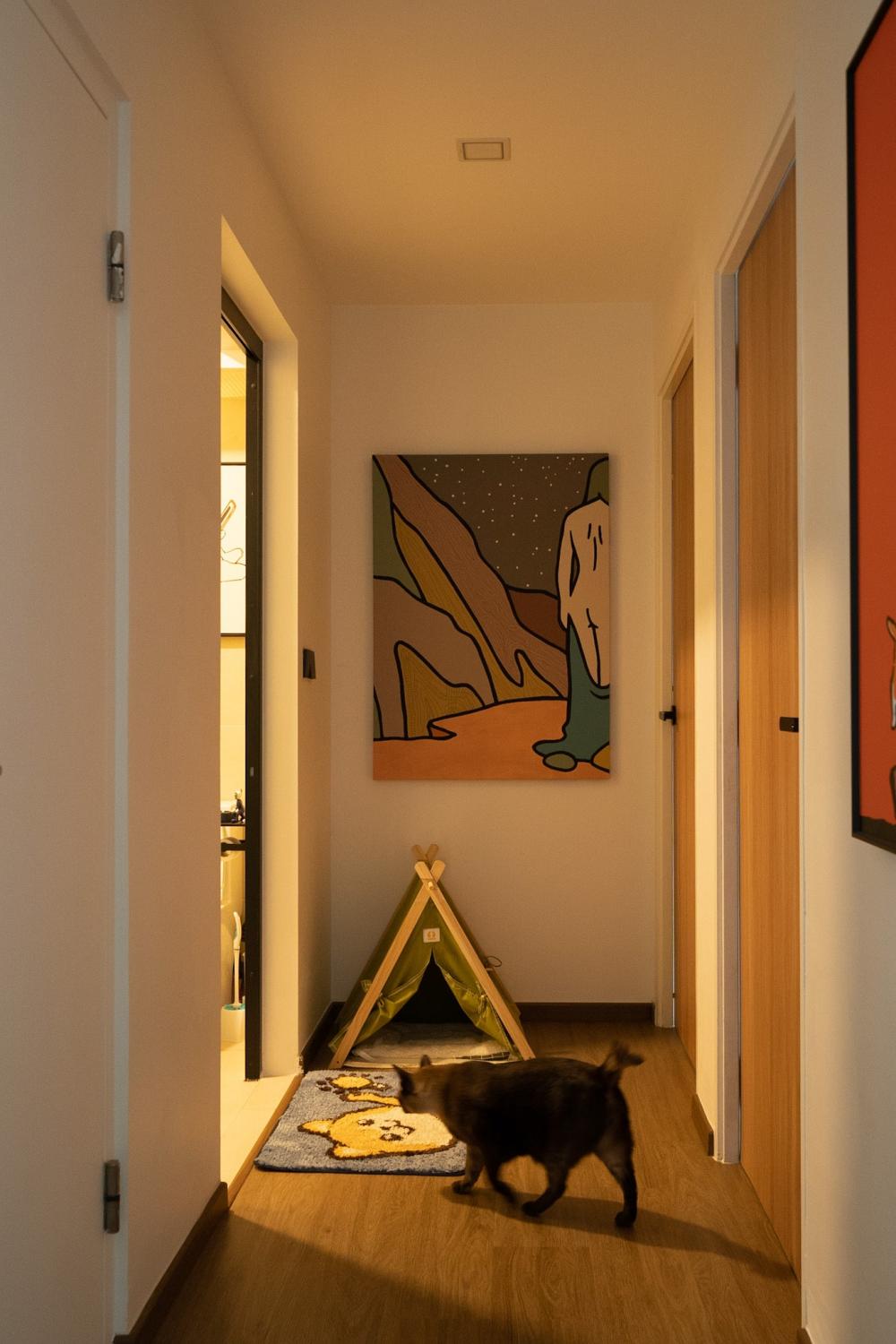 Modern Hallway with Bookshelf and Artwork
