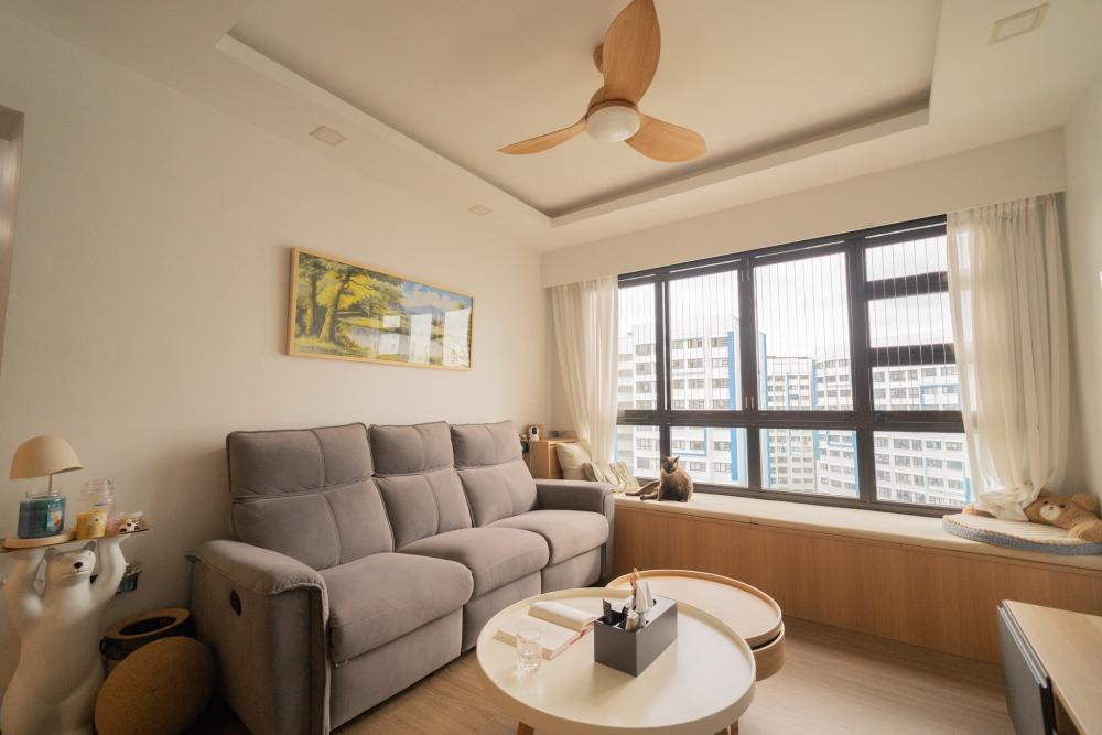 Modern Living Room with Bay Window and Sofa