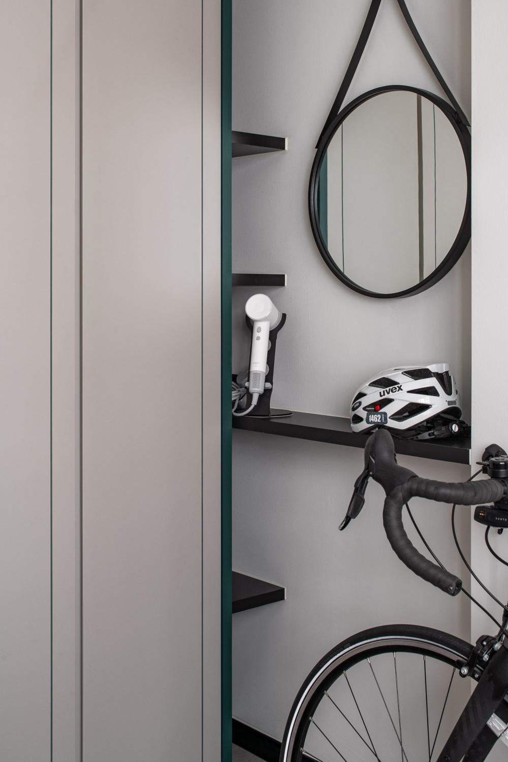 Eclectic Hallway with Bookshelf and Artwork