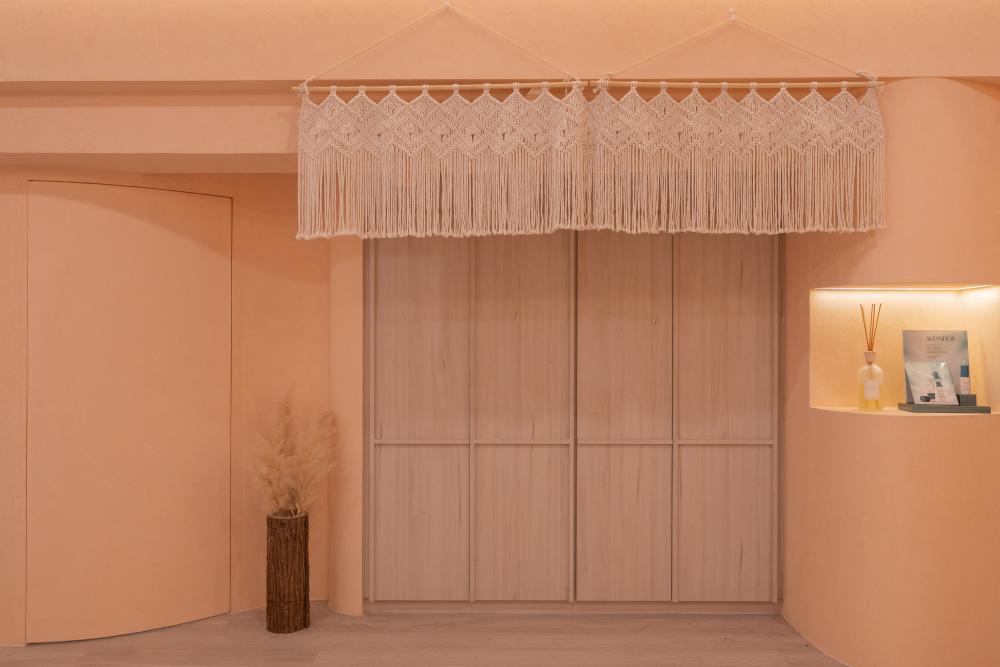 Modern Hallway with Bookshelf and Artwork