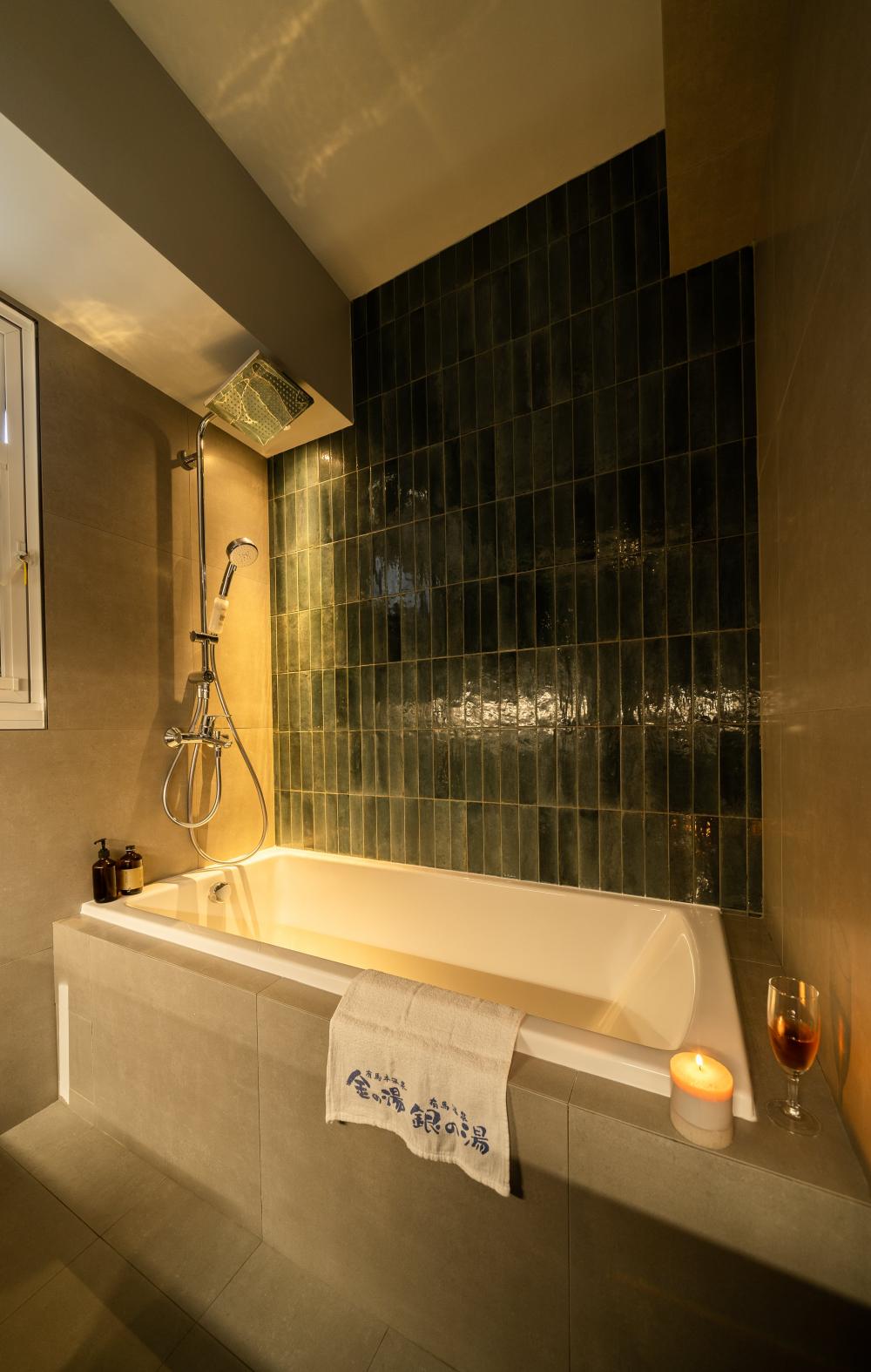 Scandinavian Bathroom with Herringbone Tiling and Mosaic
