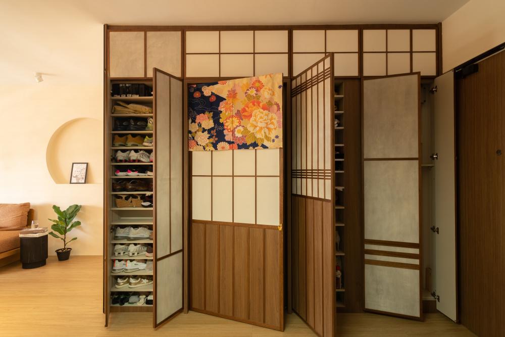 Scandinavian Foyer with Artwork and Shoe Rack
