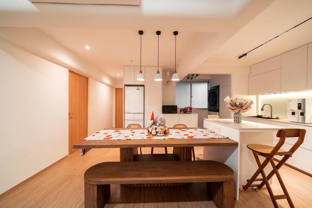 Minimalist Dining Room with Drop Light and Dining Table