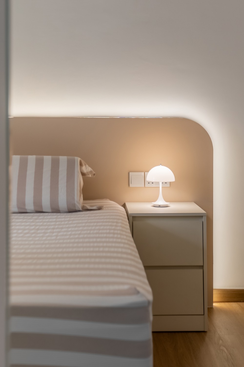 Modern Bedroom with Vinyl Flooring and Feature Wall
