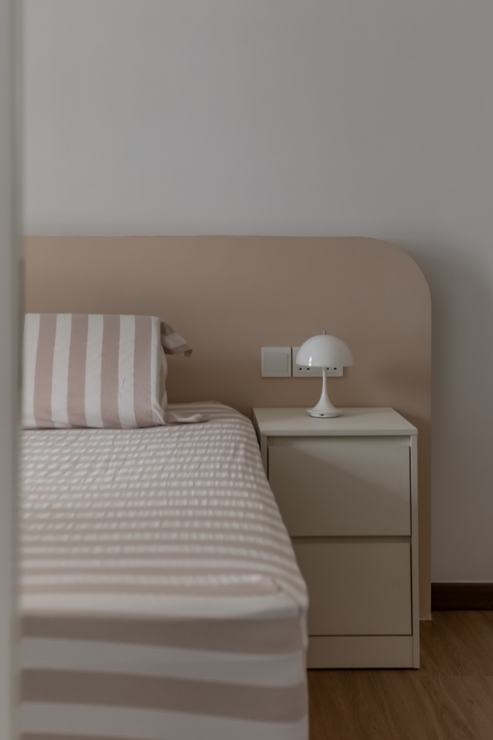 Modern Bedroom with Vinyl Flooring and Feature Wall