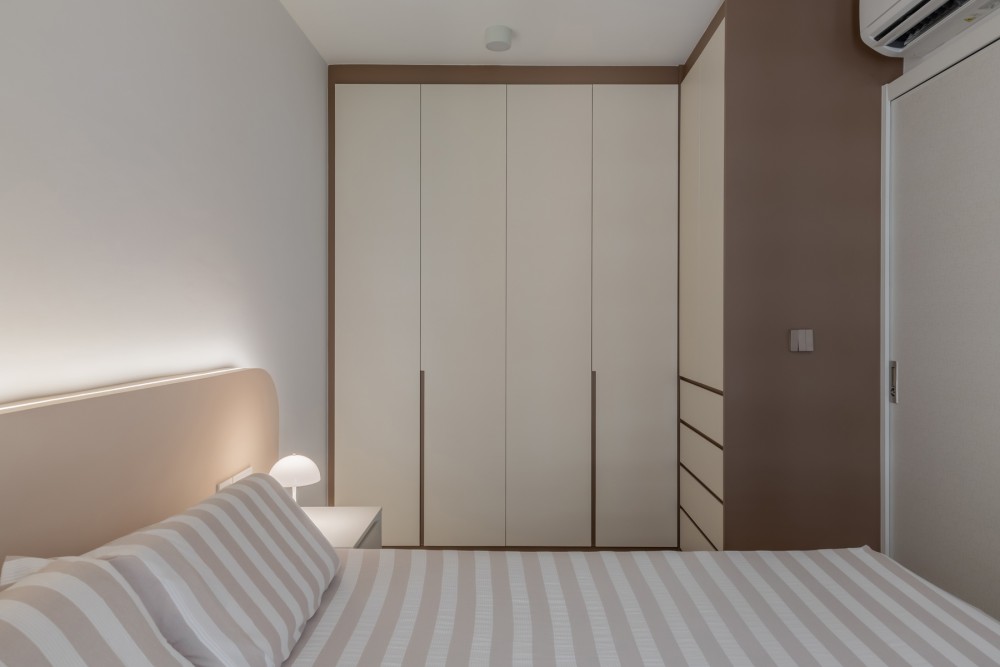 Modern Bedroom with Wardrobe and Bedside Table