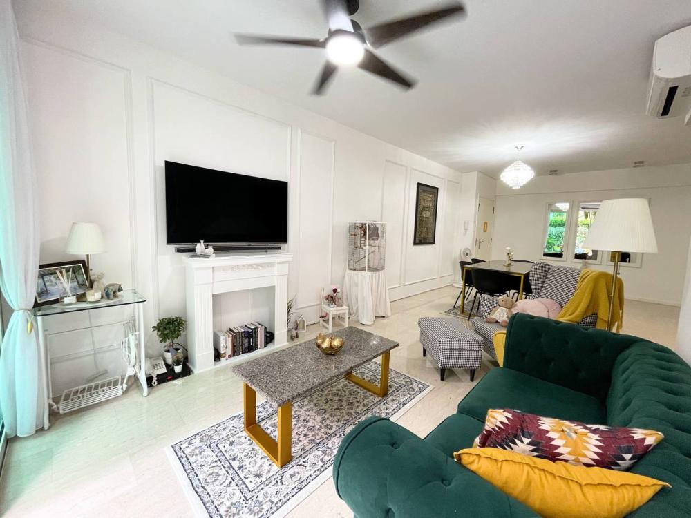 Asian Living Room with TV Console and Feature Wall