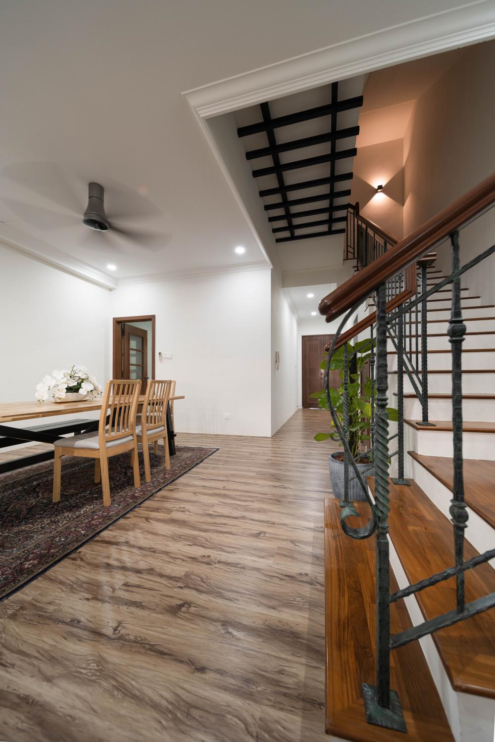 Industrial Dining Room with Staircase and Ceiling Light