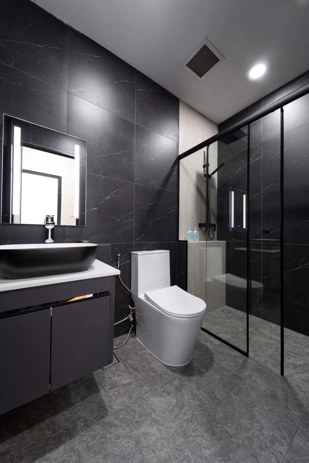 Industrial Bathroom with Homogeneous Tiles and Mirror