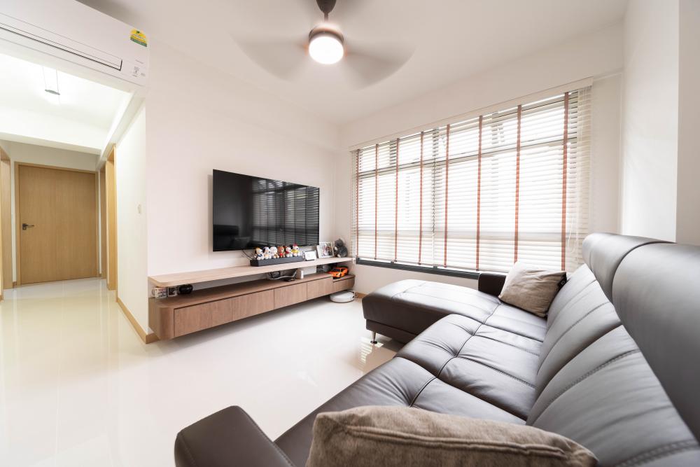 Scandinavian Living Room with Homogeneous Tiles and TV Console