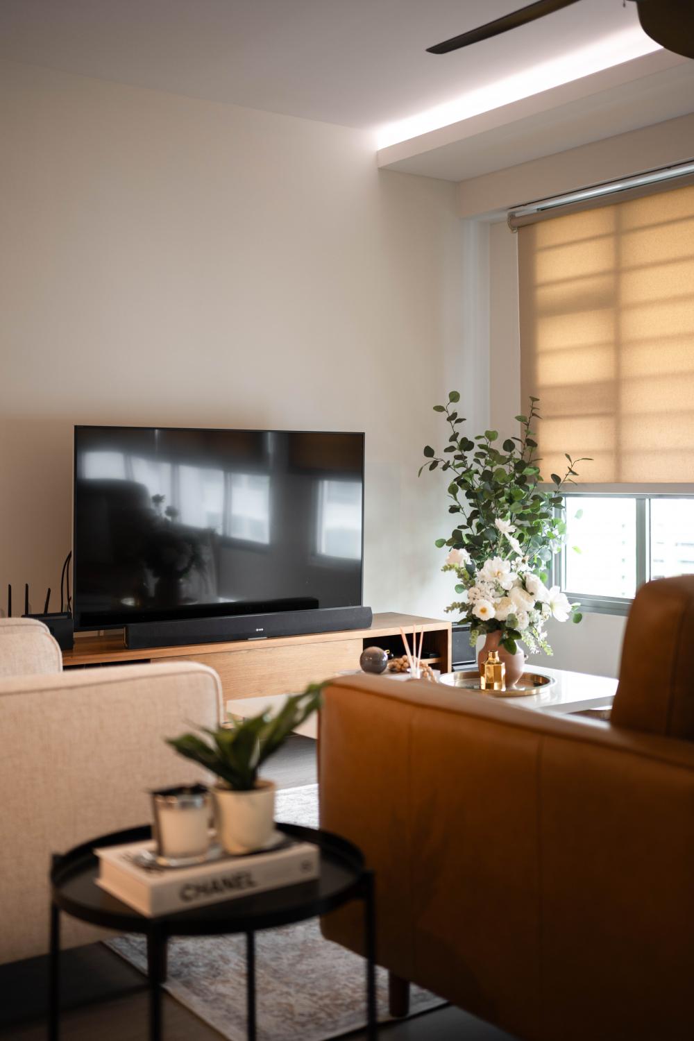 Contemporary Living Room with TV Console and Cove Lighting