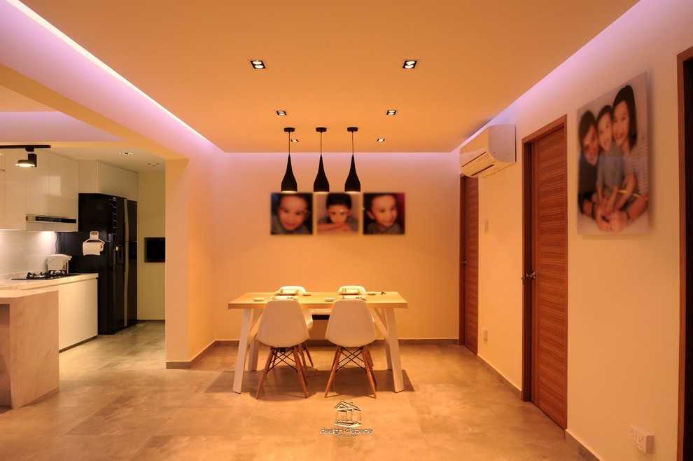 Minimalist Dining Room with Drop Light and Dining Table
