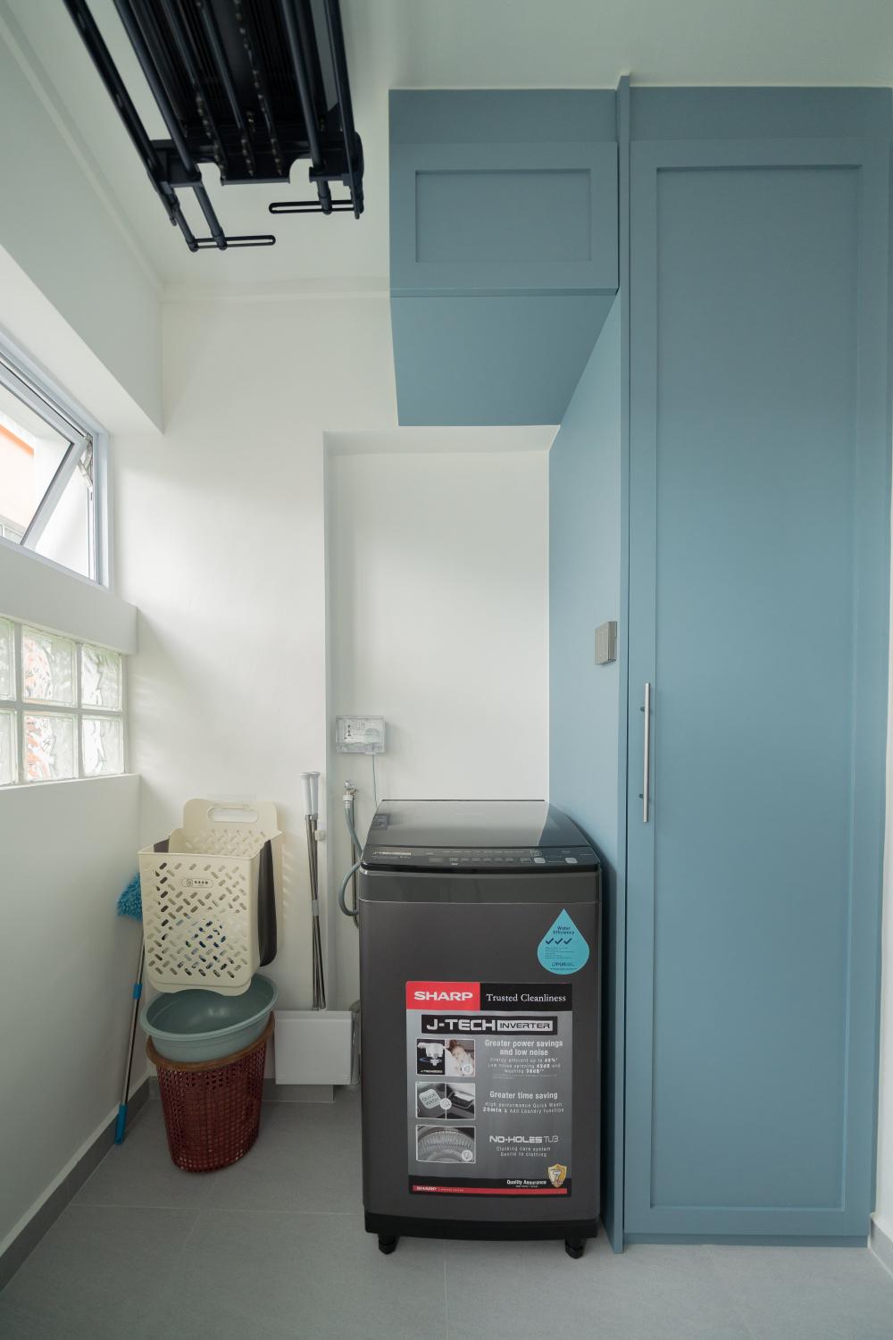 Minimalist Service Yard with Washing Machine and Laundry Area