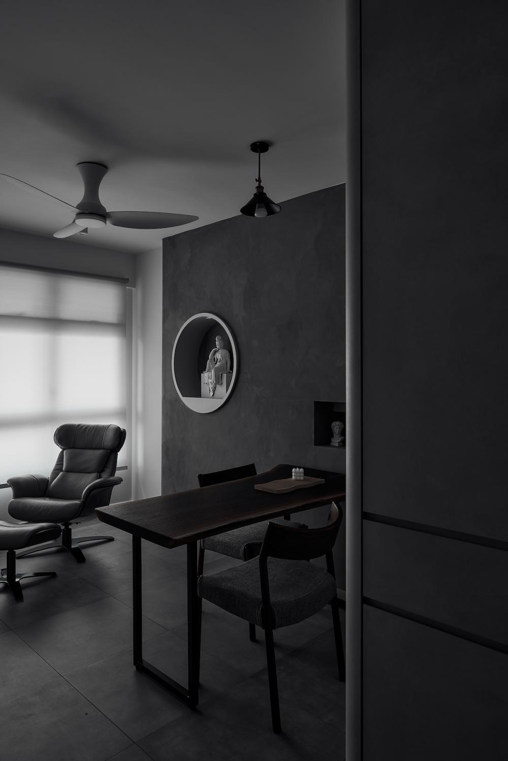 Industrial Living Room with Cement Floor and Feature Wall