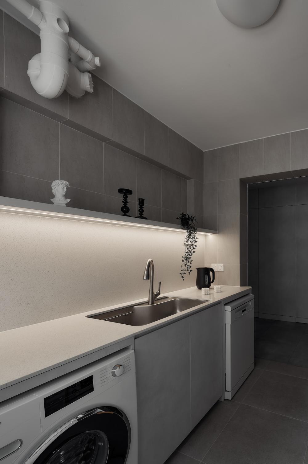 Industrial Kitchen with Countertop and Washing Machine