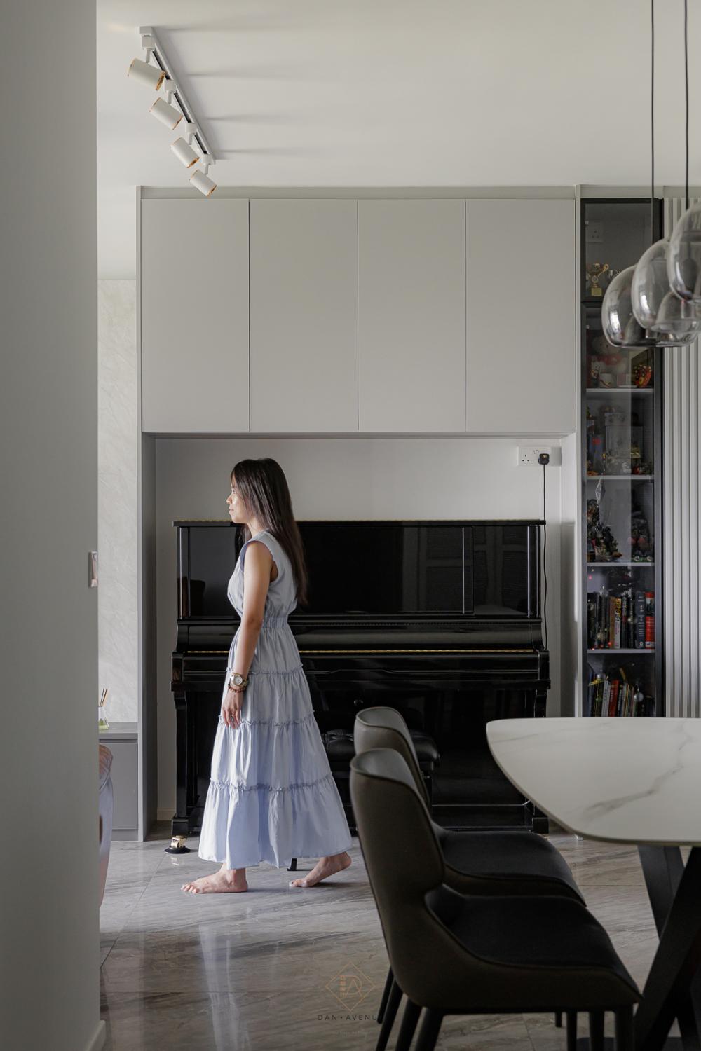 Modern Living Room with Homogeneous Tiles and Artwork