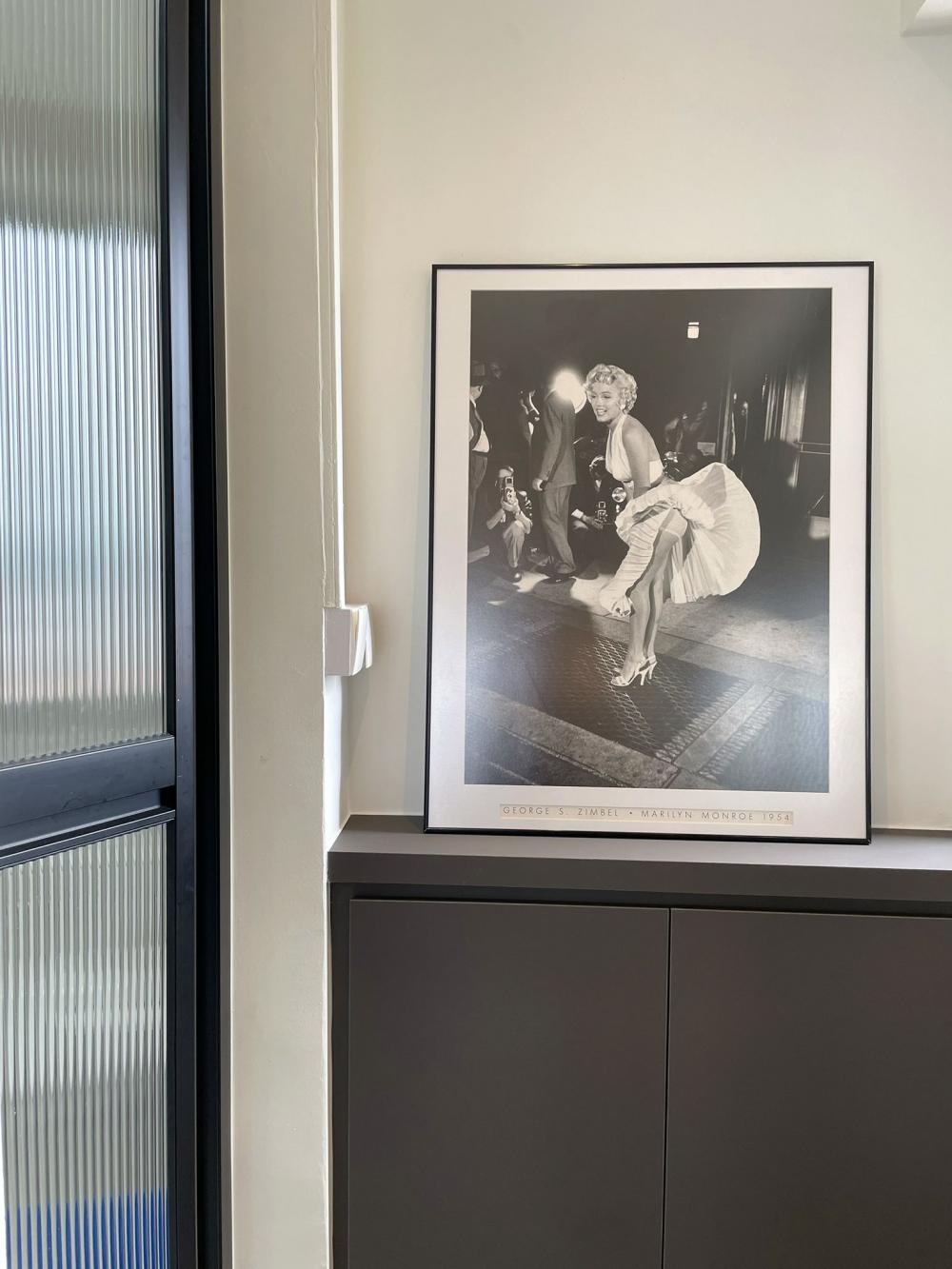 Modern Foyer with Artwork and Storage Cabinets