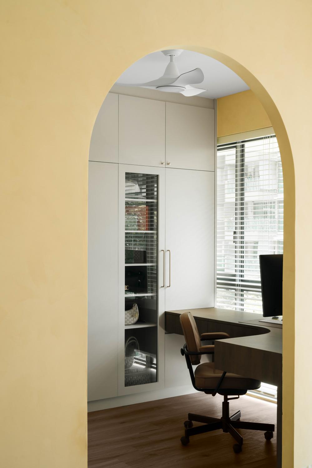 Contemporary Study with Wood Flooring and Desk