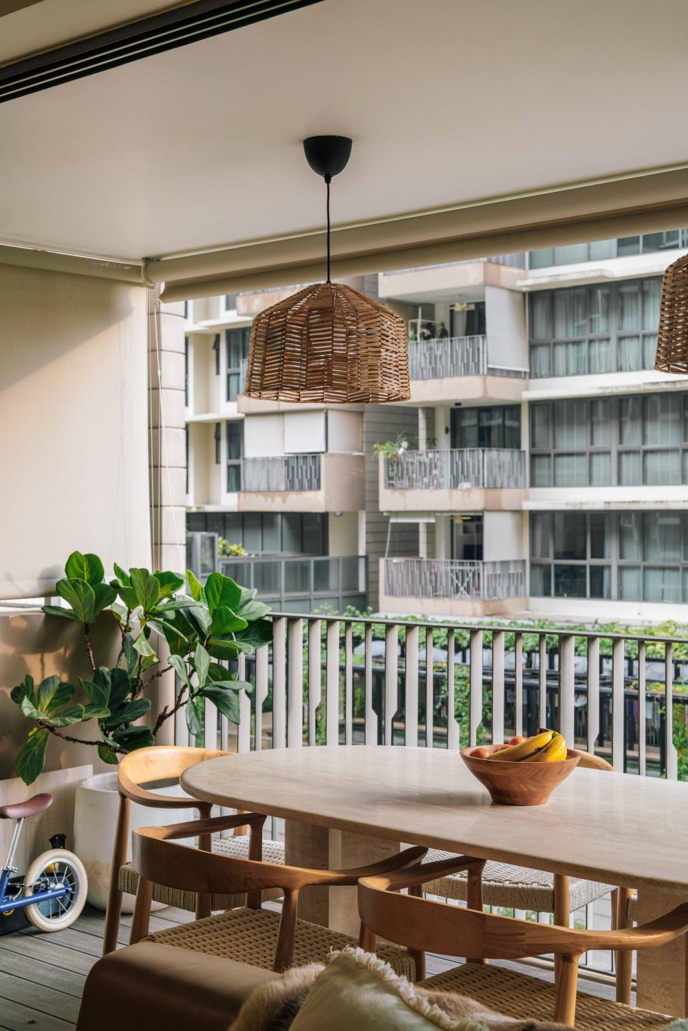 Contemporary Balcony with Outdoor Table and Lighting