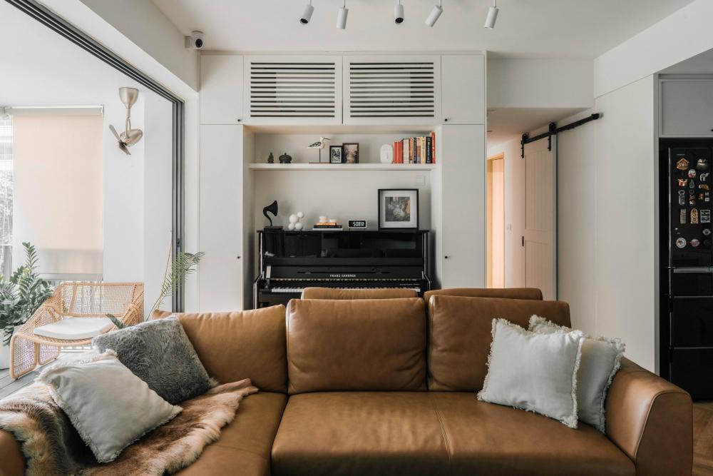 Contemporary Living Room with Bookshelf and Sofa