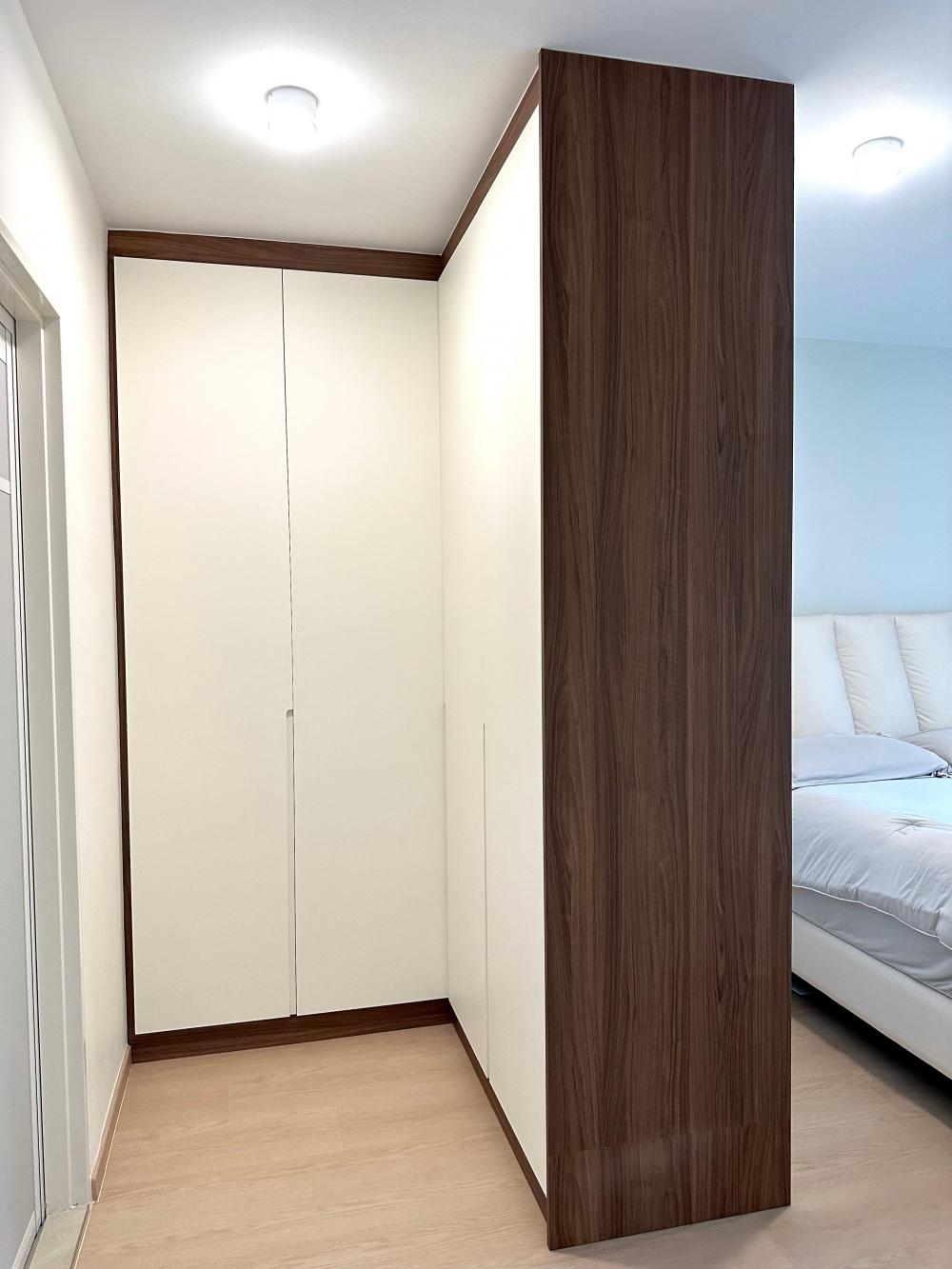 Minimalist Bedroom with Vinyl Flooring and Ceiling Light