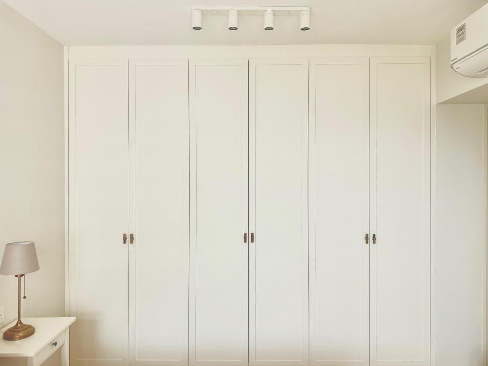 Minimalist Bedroom with Wardrobe and Bedside Table