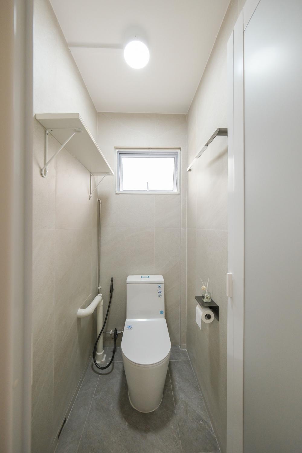 Scandinavian Bathroom with Cement Floor and Wood Flooring