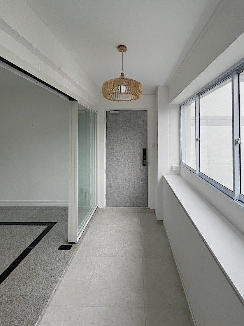 Minimalist Entryway with Shoe Rack and Small Storage