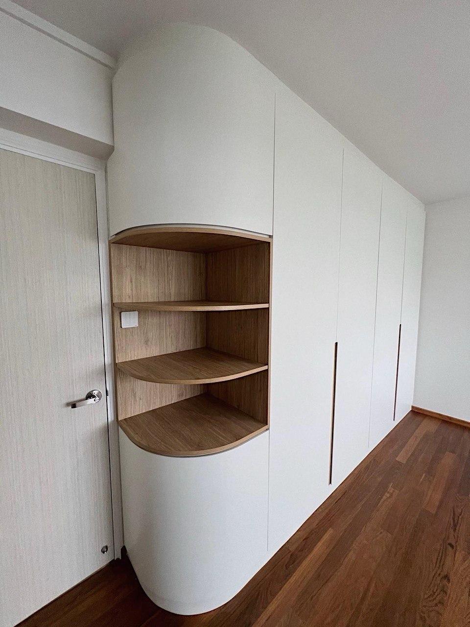Minimalist Bedroom with Bookshelf and Wood Flooring