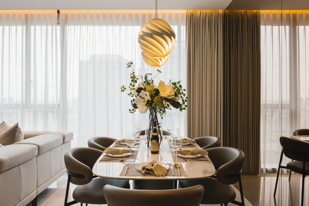 Modern Dining Room with Drop Light and Mirror