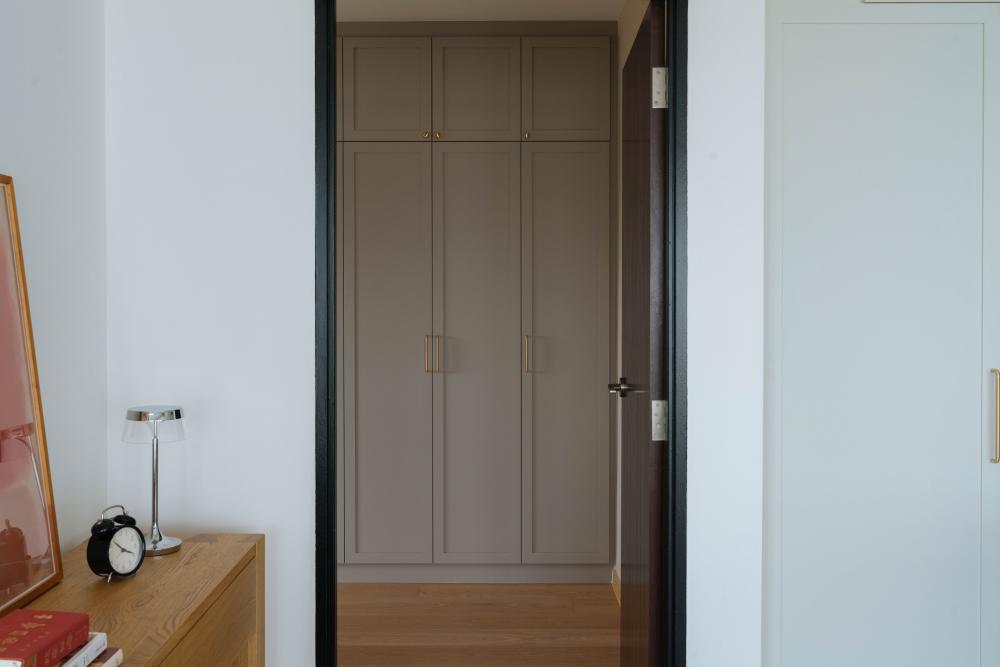 Scandinavian Bedroom with Wood Flooring and Wardrobe