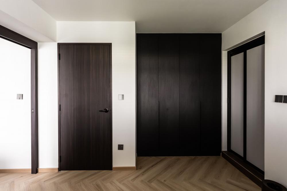 Contemporary Bedroom with Herringbone Tiling and Cove Lighting