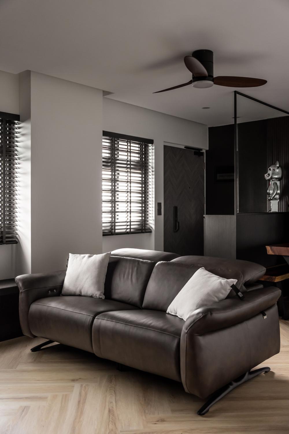 Contemporary Living Room with Herringbone Tiling and Wood Flooring