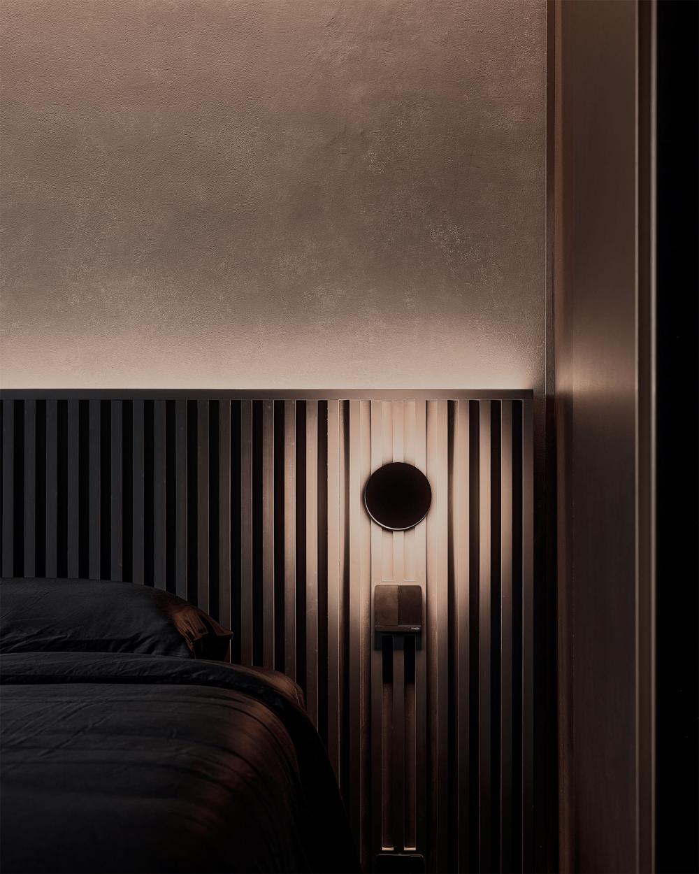 Contemporary Bedroom with Feature Wall and Cove Lighting