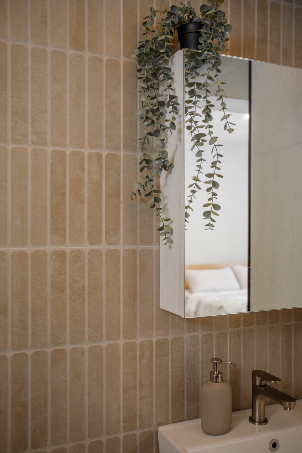 Scandinavian Bathroom with Homogeneous Tiles and Mirror