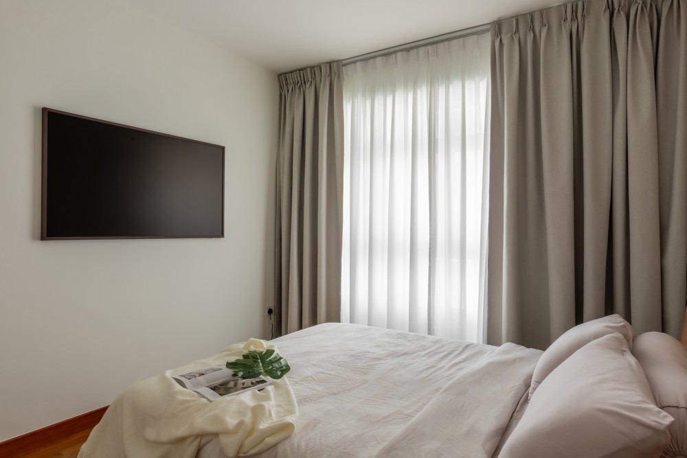 Scandinavian Bedroom with Curtain and TV