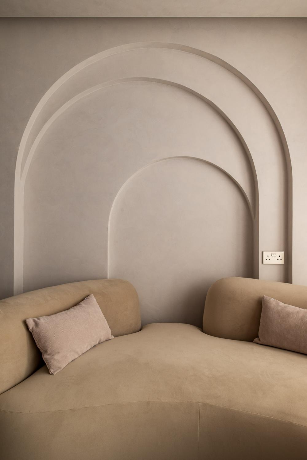 Modern Living Room with Homogeneous Tiles and Feature Wall