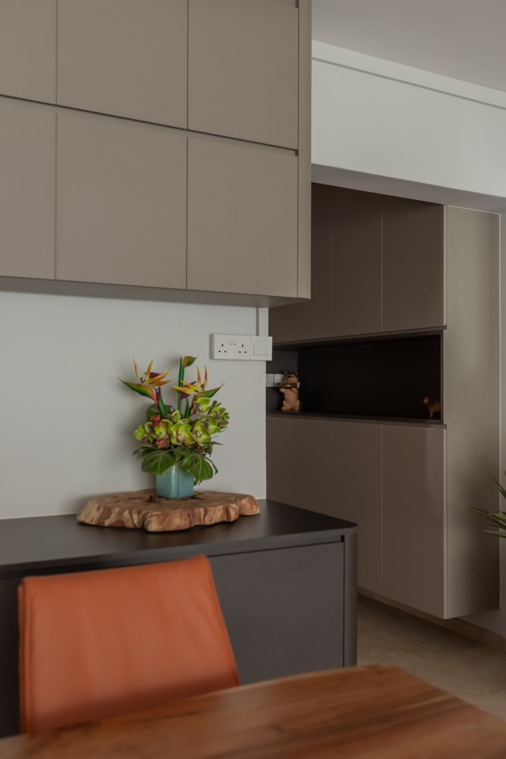 Contemporary Entryway with Feature Wall and Storage Cabinets