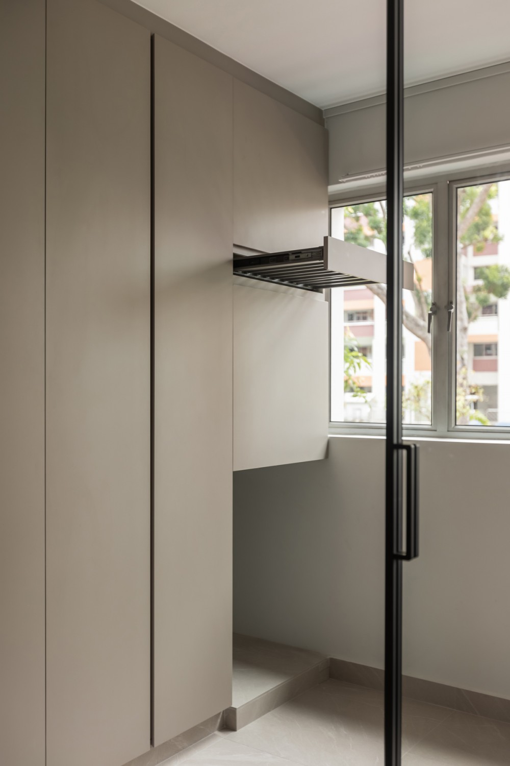 Contemporary Balcony with Glass Door and Storage Cabinets