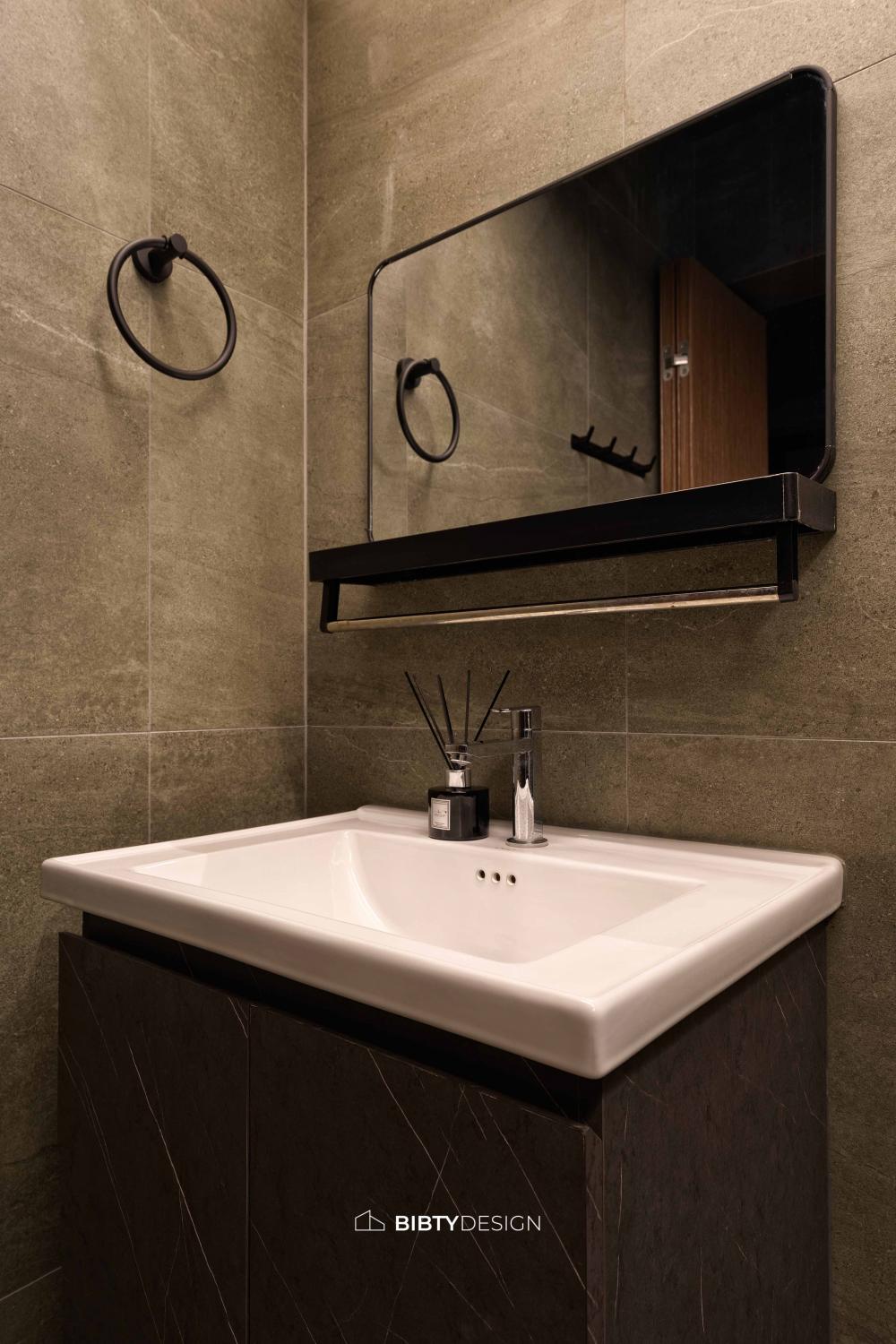 Industrial Bathroom with Homogeneous Tiles and Mirror