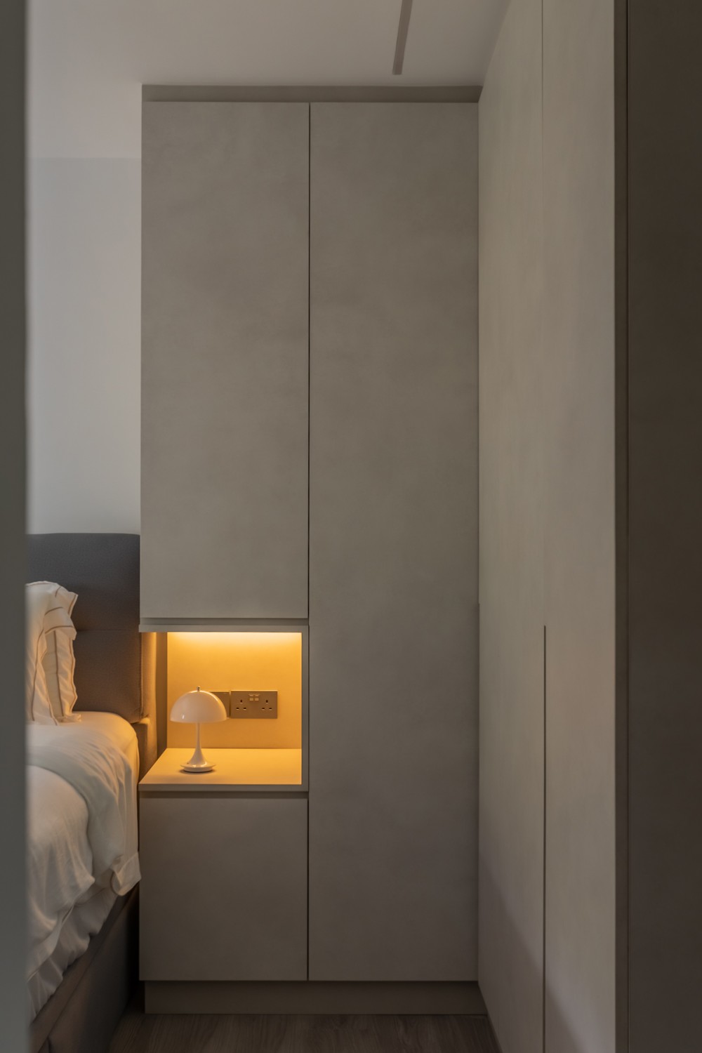 Minimalist Bedroom with Vinyl Flooring and Ceiling Light